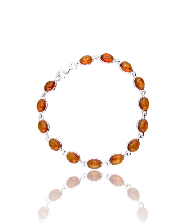 Bransoletka owalny koniakowy bursztyn w srebrnej oprawie